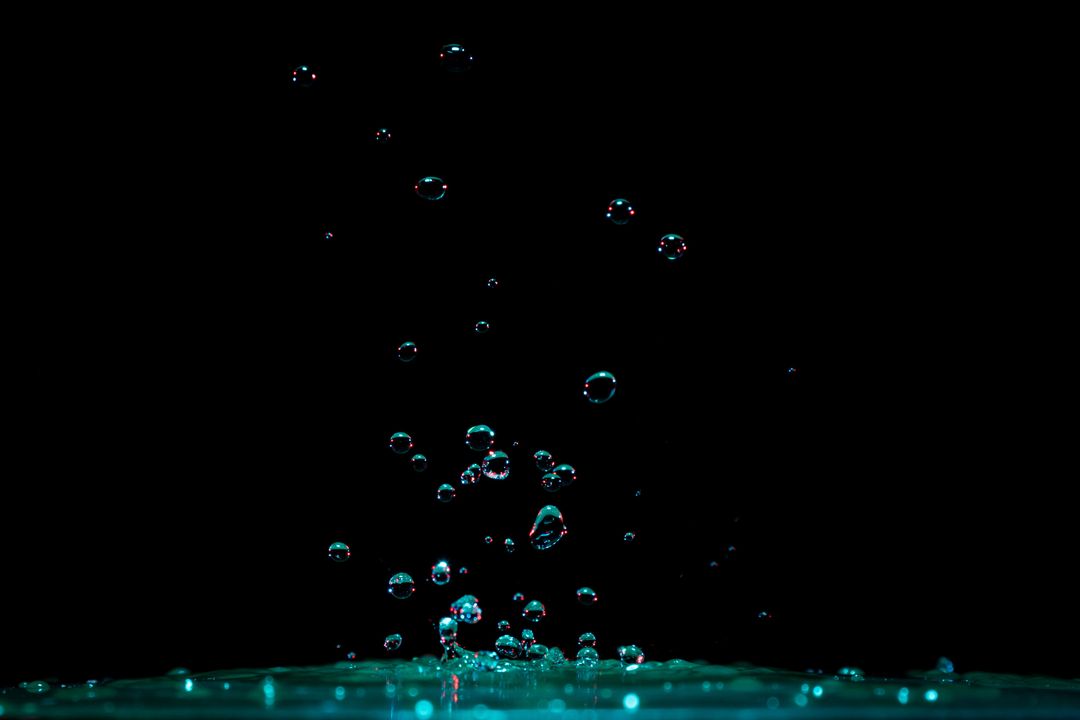 Close-up of Water Splashing Against Black Background - Free Images, Stock Photos and Pictures on Pikwizard.com