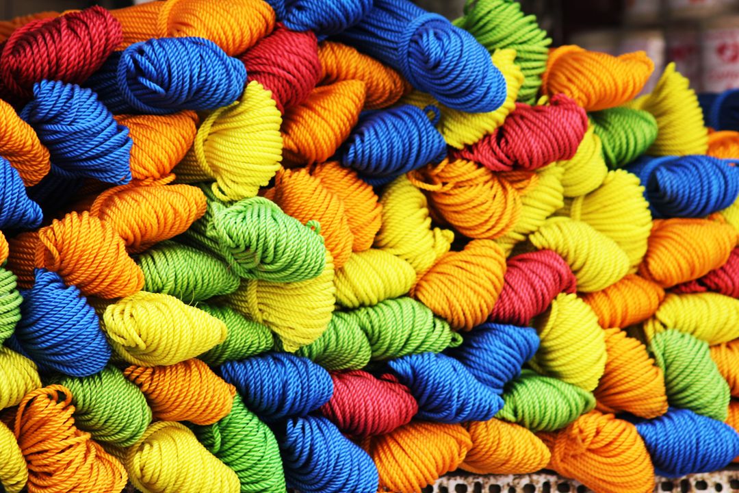 a bunch of colorful yarn from Pikwizard