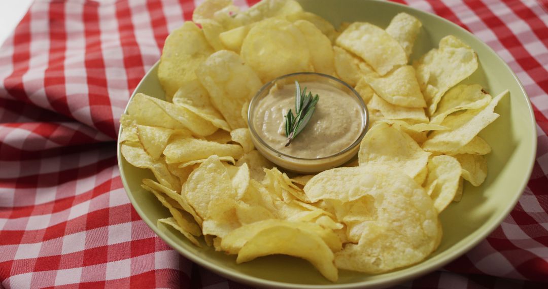 Image of crisps and cheese dip on a wooden surface - Free Images, Stock Photos and Pictures on Pikwizard.com