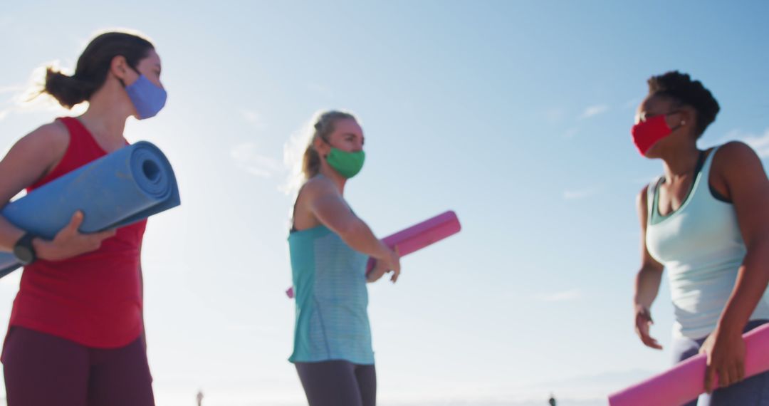 Women Holding Yoga Mats · Free Stock Photo