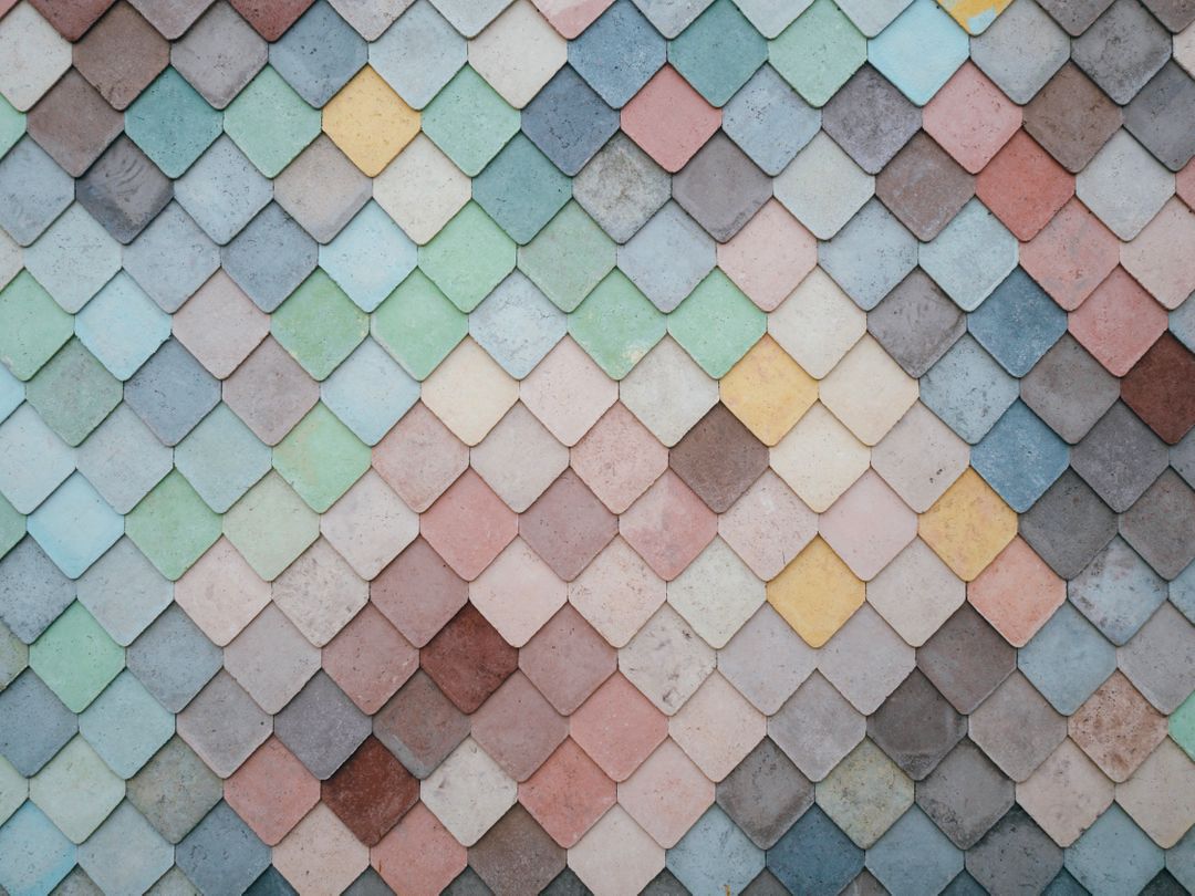 a wall with many different colored tiles - Free Images, Stock Photos and Pictures on Pikwizard.com