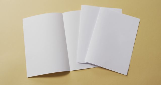 Sheets Of Yellow Printer Paper Falling On White Background Stock