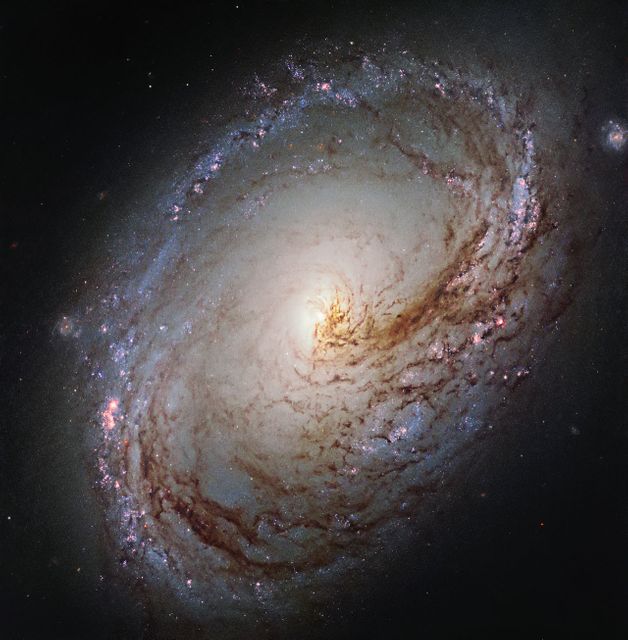 Hubble Peers into the Heart of a Galactic Maelstrom - Download Free Stock Photos Pikwizard.com