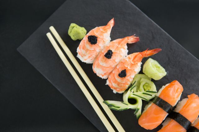 Sushi with chopsticks - Download Free Stock Photos Pikwizard.com