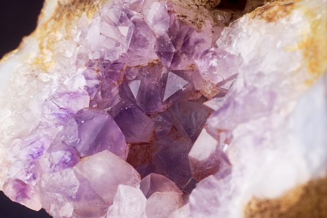 a purple rock with crystals - Download Free Stock Photos Pikwizard.com