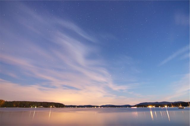 a lake at night - Download Free Stock Photos Pikwizard.com