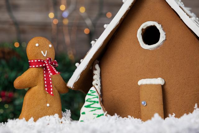 Gingerbread house and cookie arranged together - Download Free Stock Photos Pikwizard.com