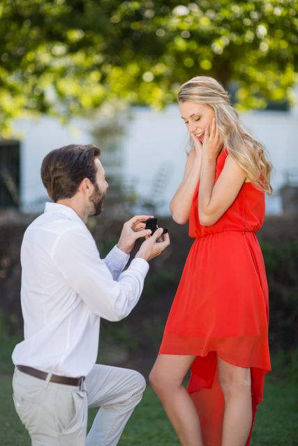 Man proposing a woman with a ring on his knee - Download Free Stock Photos Pikwizard.com