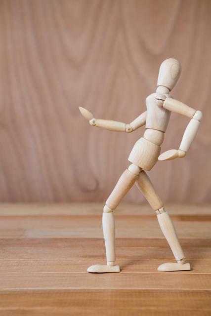 Wooden Mannequin With Walking Pose Stock Photo - Download Image