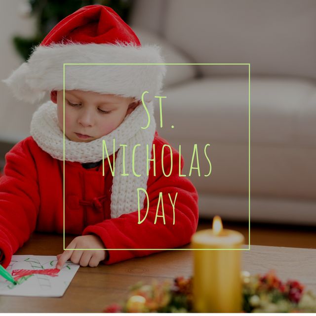 Composition of st nicholas day text over caucasian boy in santa claus outfit writing. Christmas festivity, tradition and celebration concept.