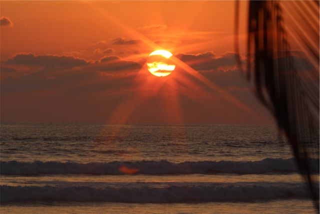 the sun setting over the ocean - Download Free Stock Photos Pikwizard.com