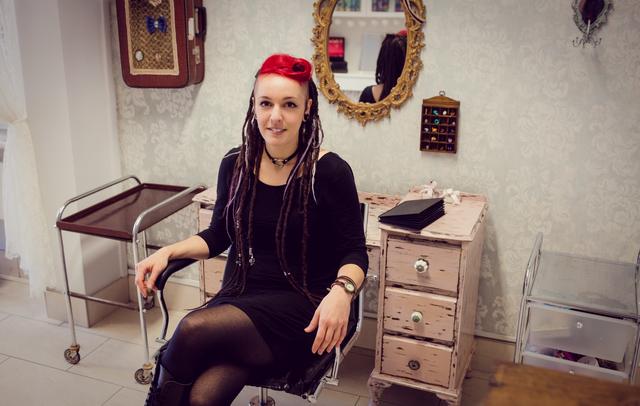 Female hairdresser in dreadlocks shop - Download Free Stock Photos Pikwizard.com