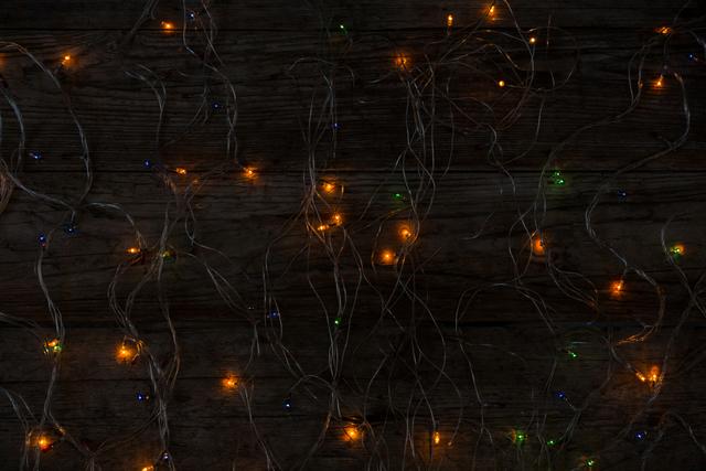 Rice lights illuminated on wooden plank - Download Free Stock Photos Pikwizard.com