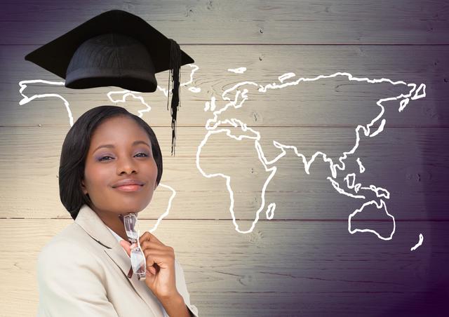 Woman with graduation cap and world map on wooden background - Download Free Stock Photos Pikwizard.com