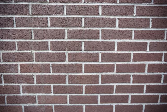 Close-up of new brick wall background - Download Free Stock Photos Pikwizard.com