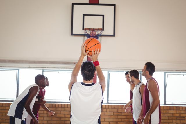 Basketball player about to take a penalty shot while playing basketball - Download Free Stock Photos Pikwizard.com