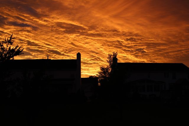 Silhouette of Buildings Under Orange Sky during Sunset - Download Free Stock Photos Pikwizard.com