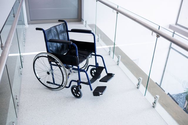 Empty wheelchair in the passageway at the hospital