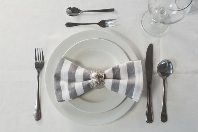 Plate and cutlery set elegantly on a table - Download Free Stock Photos Pikwizard.com