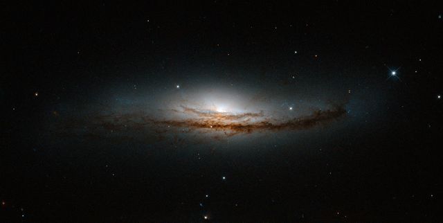 Hubble Peers at the Heart of a Spiral Galaxy - Download Free Stock Photos Pikwizard.com