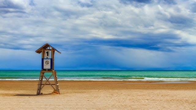 Landscape Photo of Life Guard House Near Sea Under White Cloudy Blue Sky at Daytime - Download Free Stock Photos Pikwizard.com
