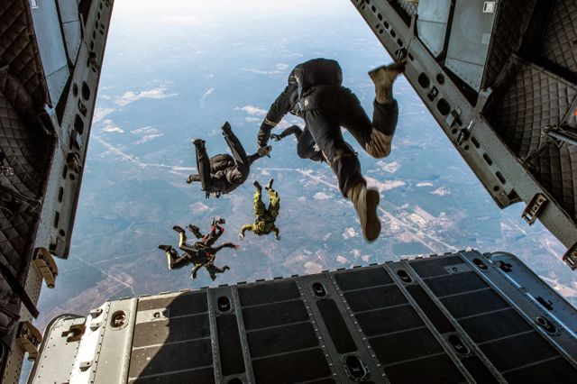 Danger jumping military para rescuers - Download Free Stock Photos Pikwizard.com