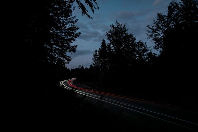 Dark light streaks long exposure road - Download Free Stock Photos Pikwizard.com