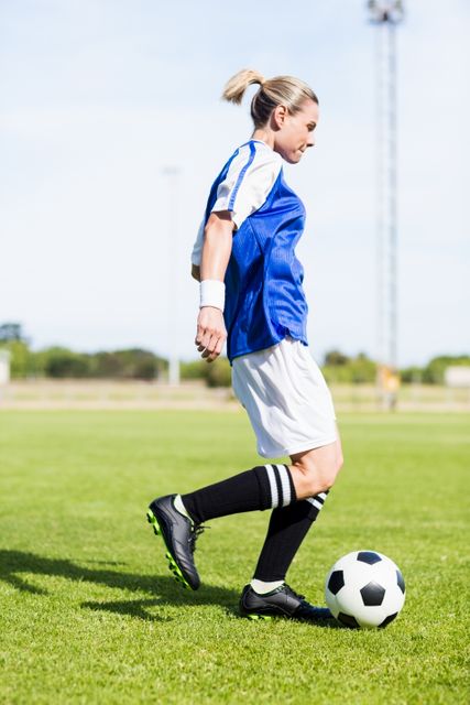 Female football player practicing soccer - Download Free Stock Photos Pikwizard.com
