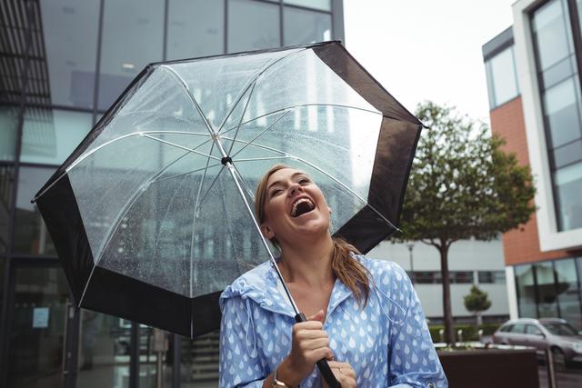 Beautiful woman enjoying rain - Download Free Stock Photos Pikwizard.com