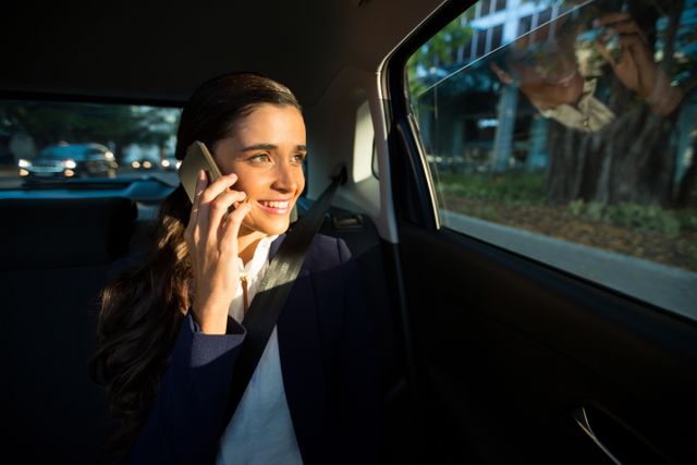 Business executive talking on mobile phone in car - Download Free Stock Photos Pikwizard.com