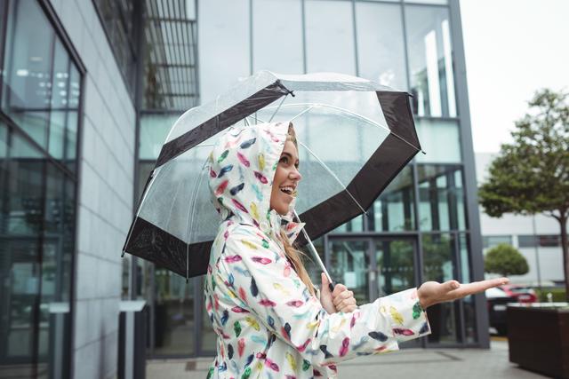 Beautiful woman holding umbrella - Download Free Stock Photos Pikwizard.com