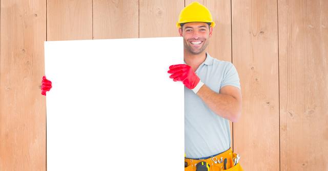 Portrait of happy repairman holding blank bill board - Download Free Stock Photos Pikwizard.com