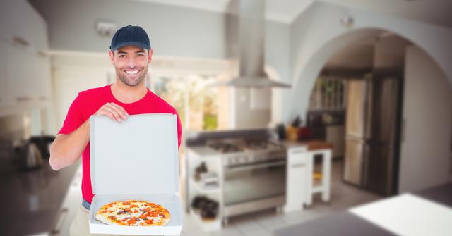 Delivery man showing pizza in box - Download Free Stock Photos Pikwizard.com