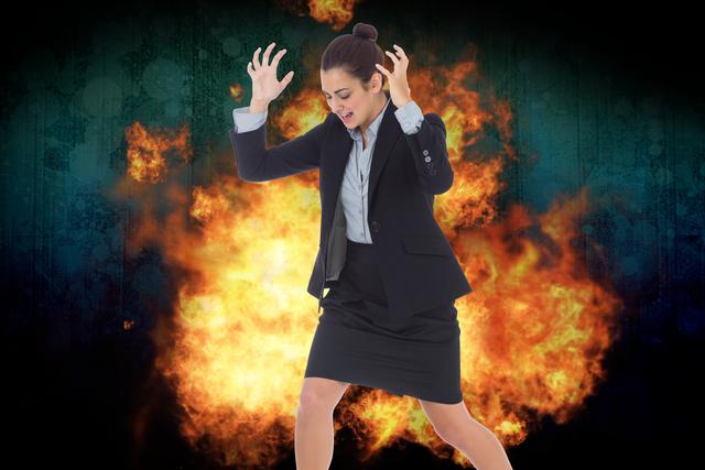 Digital composite image of angry businesswoman with fire - Download Free Stock Photos Pikwizard.com