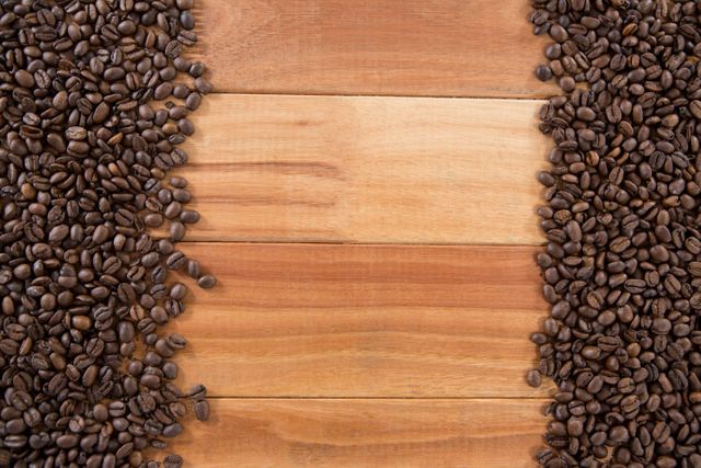 Coffee beans arranged on wooden table - Download Free Stock Photos Pikwizard.com