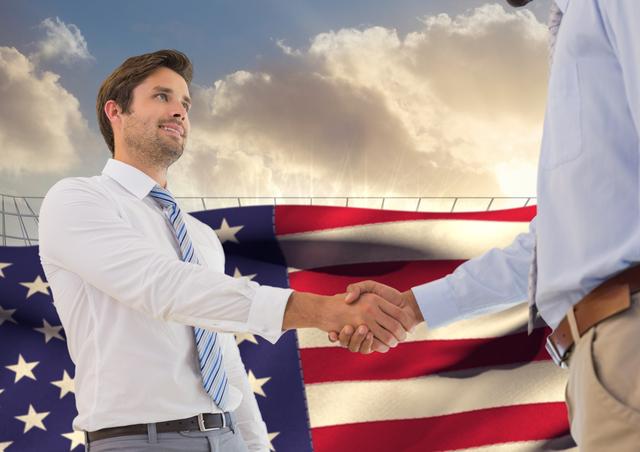 Businessman shaking hands against american flag background - Download Free Stock Photos Pikwizard.com