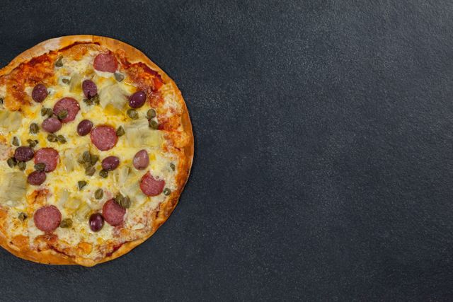 Delicious italian pizza served on grey background - Download Free Stock Photos Pikwizard.com
