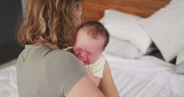 Image of happy caucasian mother hugging newborn baby - Download Free Stock Photos Pikwizard.com