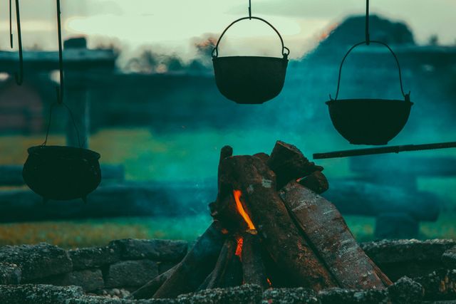 Black Cooking Pot Near Burning Woods - Download Free Stock Photos Pikwizard.com
