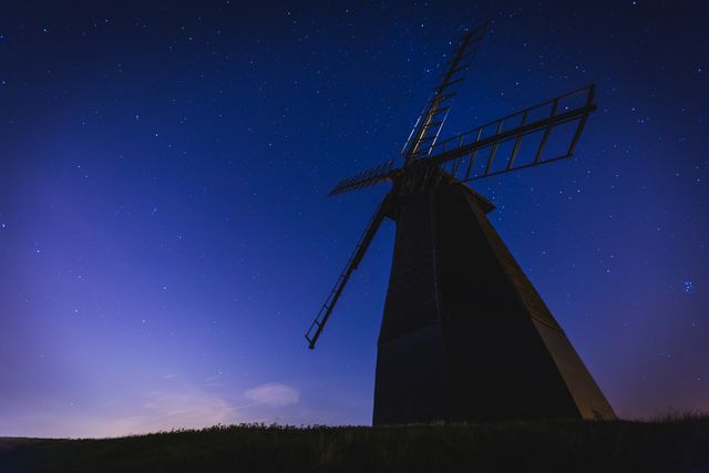 White Windmill in a Low Angle Photography during Nighttime - Download Free Stock Photos Pikwizard.com