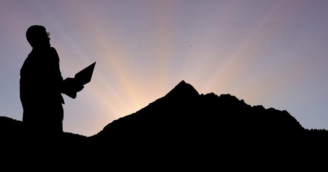 Silhouette businessman on mountain during sunset - Download Free Stock Photos Pikwizard.com
