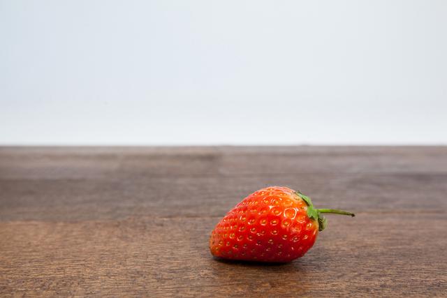 Strawberry on wooden table - Download Free Stock Photos Pikwizard.com