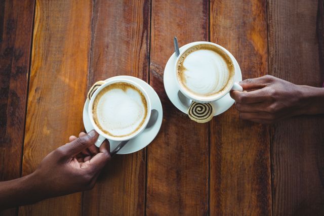 Couple hand holding cup of coffee - Download Free Stock Photos Pikwizard.com
