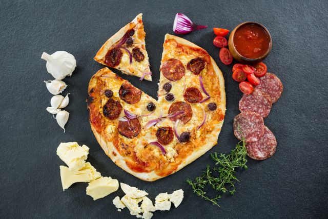 Italian pizza with various ingredients and salami - Download Free Stock Photos Pikwizard.com