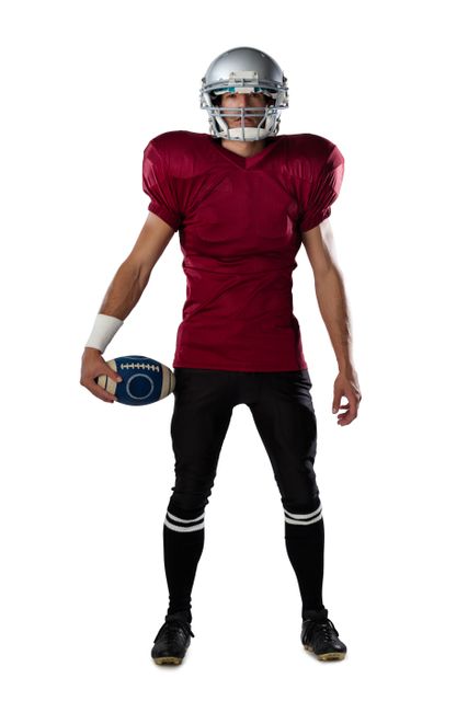 Full length of determined American football player wearing helmet - Download Free Stock Photos Pikwizard.com