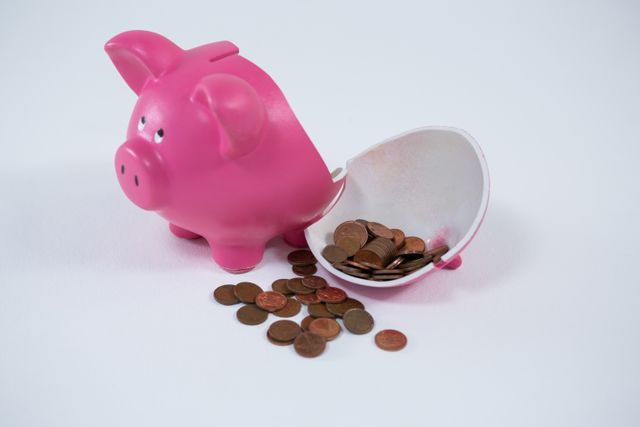 Piggy bank broken with money - Download Free Stock Photos Pikwizard.com