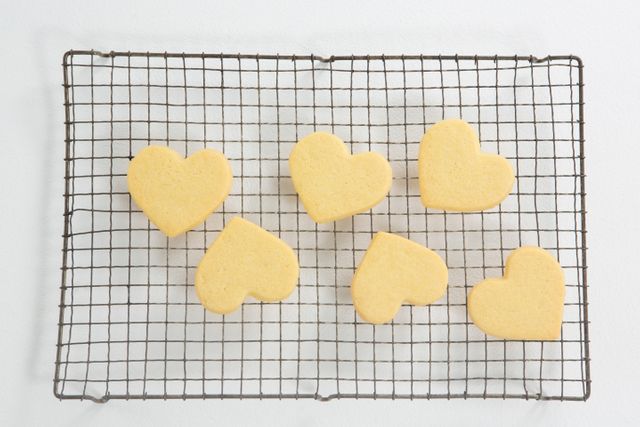 Close-up of heart shape cookies on cooling rack - Download Free Stock Photos Pikwizard.com