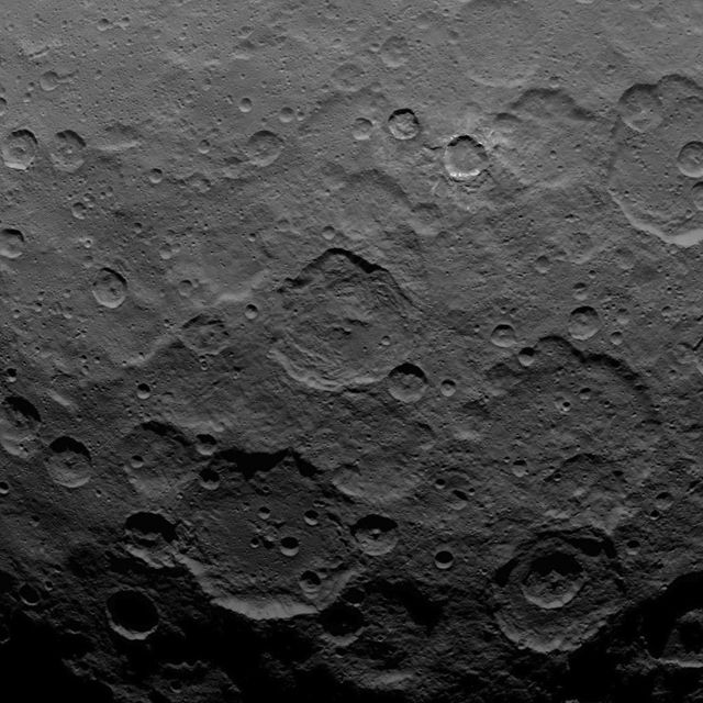 This image, taken by NASA Dawn spacecraft, shows dwarf planet Ceres from an altitude of 2,700 miles 4,400 kilometers. The image, with a resolution of 1,400 feet 410 meters per pixel, was taken on June 25, 2015.  http://photojournal.jpl.nasa.gov/catalog/PIA19601