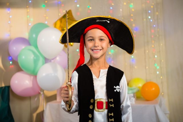Boy pretending to be as pirate during birthday party - Download Free Stock Photos Pikwizard.com