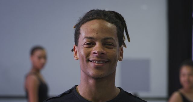 Portrait of happy biracial male dancer with dreadlocks at dance class, copy space - Download Free Stock Photos Pikwizard.com